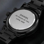 Close-up of brushed caseback engraving: DANIEL, SO PROUD OF YOU, LOVE, DAD