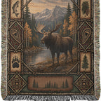Close view of the 37 x 52 lodge woven blanket: moose, snowy peaks and golden aspens with trout, snowshoe and paw track side panels