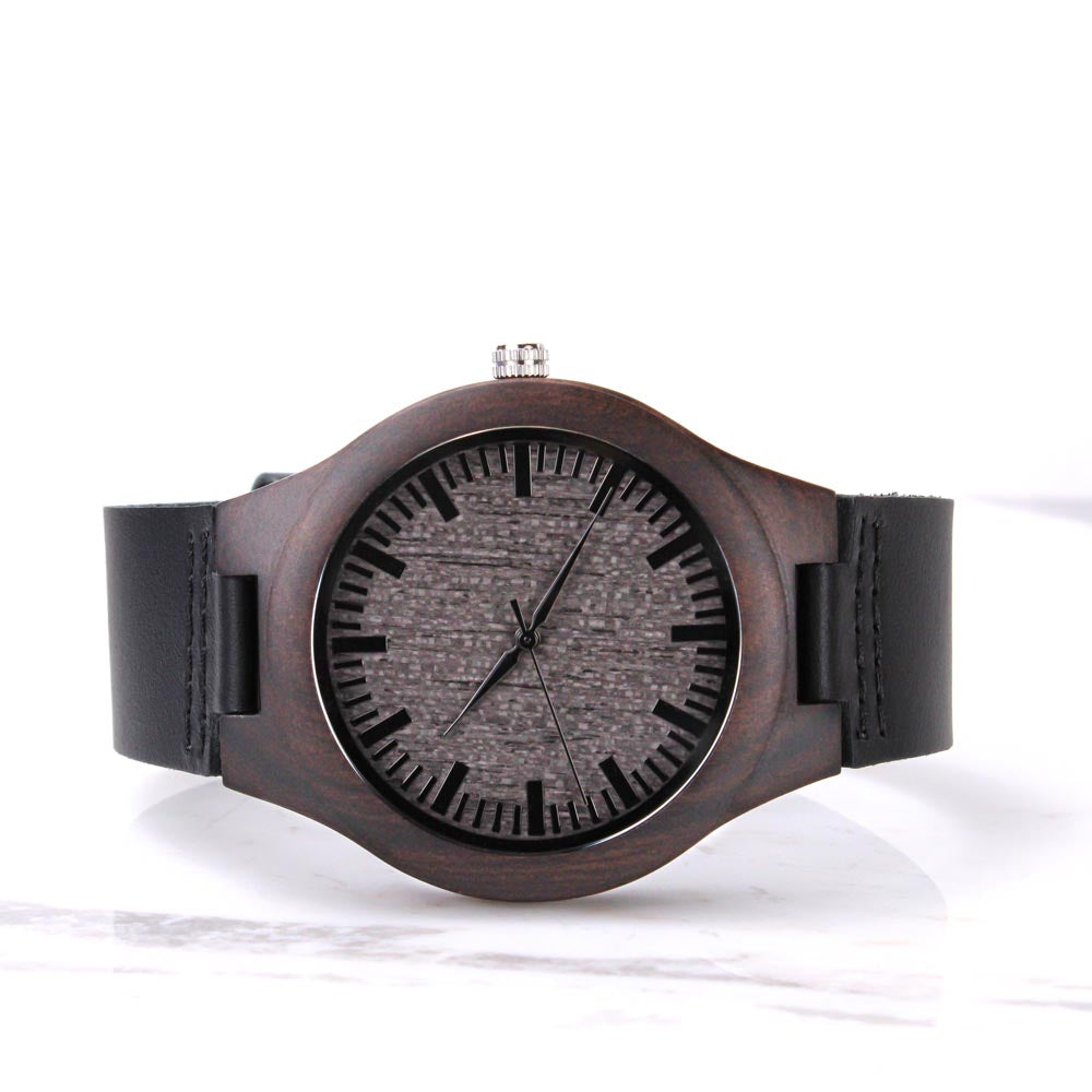 Wooden watch front view on white background