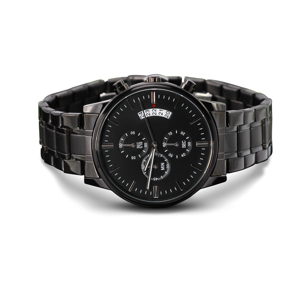 Front view of a black chronograph watch with a black metal bracelet on a white background