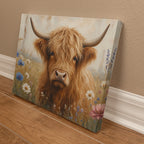 Highland cow canvas angled on the floor, showing the gallery-wrapped side with the painting continuing around the edge