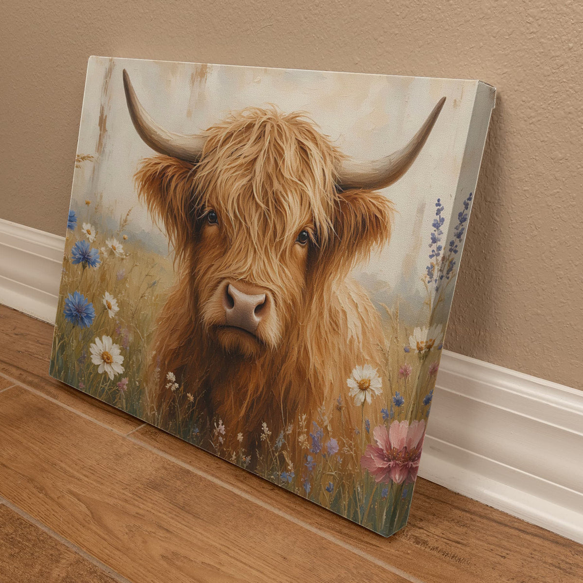 Highland cow canvas angled on the floor, showing the gallery-wrapped side with the painting continuing around the edge