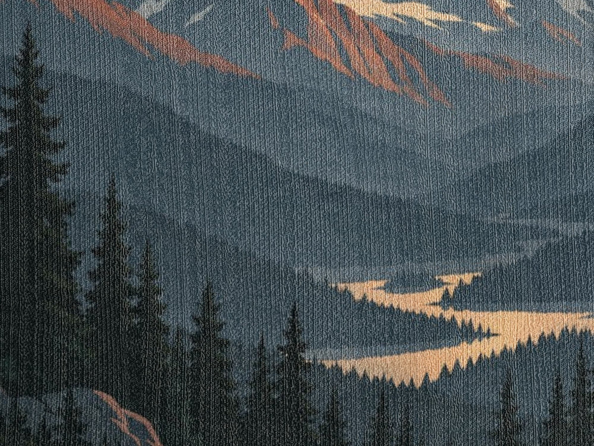 Close view of the lower Mountain Sunrise design in woven cotton: misty blue ridges, a golden winding river and dark pine trees.