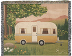 Family Caravan personalized woven cotton blanket artwork panel, the full woven scene from the top fringe down to the cream lettering panel.