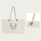 Cream rope attachment detail with the complete personalized AMH weekender for context.