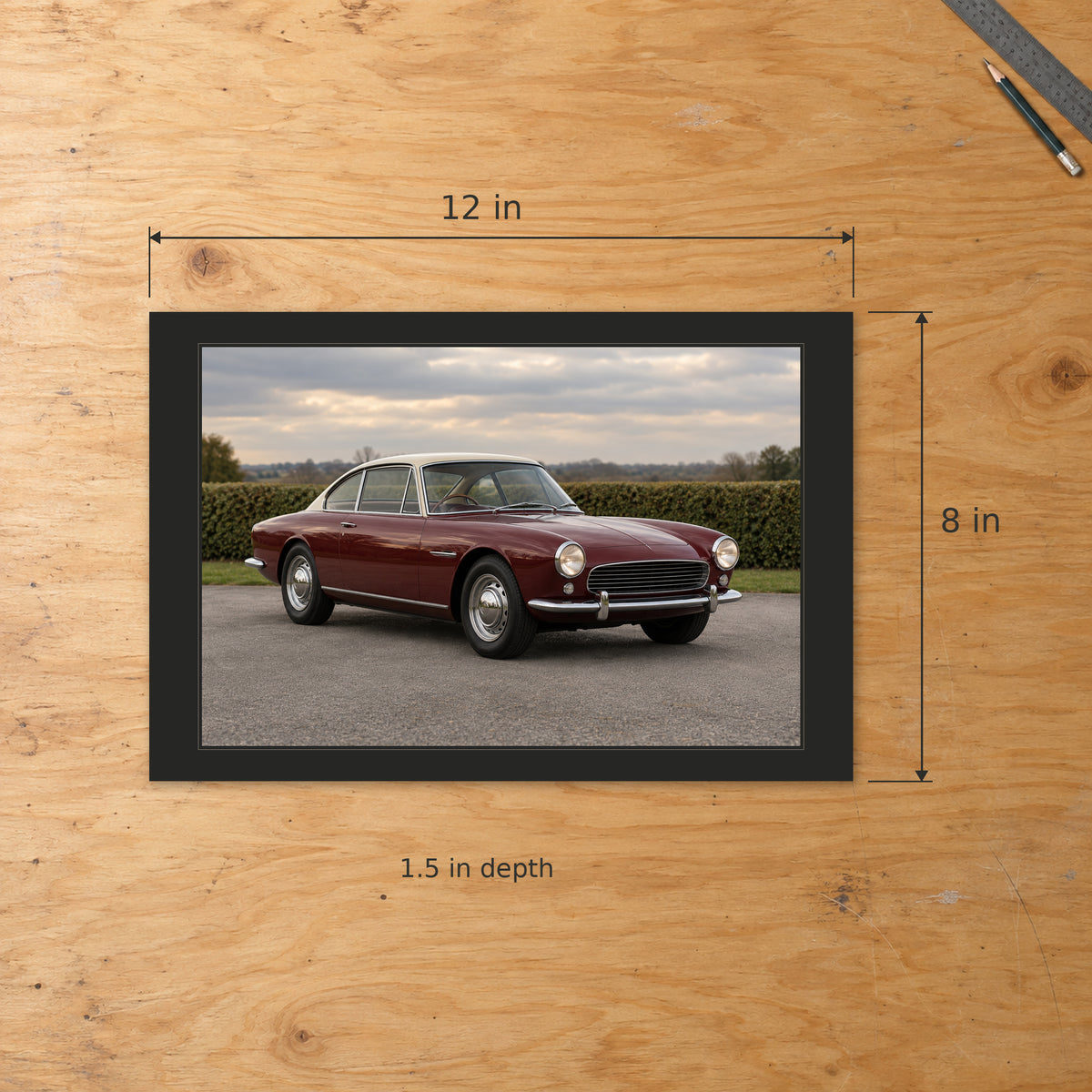 Complete 12 by 8 inch classic car canvas on a workshop surface with width, height and 1.5 inch depth labels.