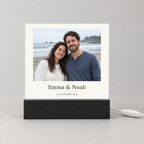 Personalized anniversary photo plaque with a couple's photo, names and date on a black LED base with controller