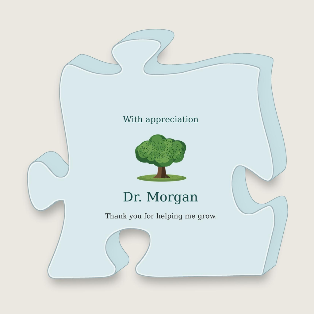 Angled view of the same puzzle-piece plaque showing its thickness.