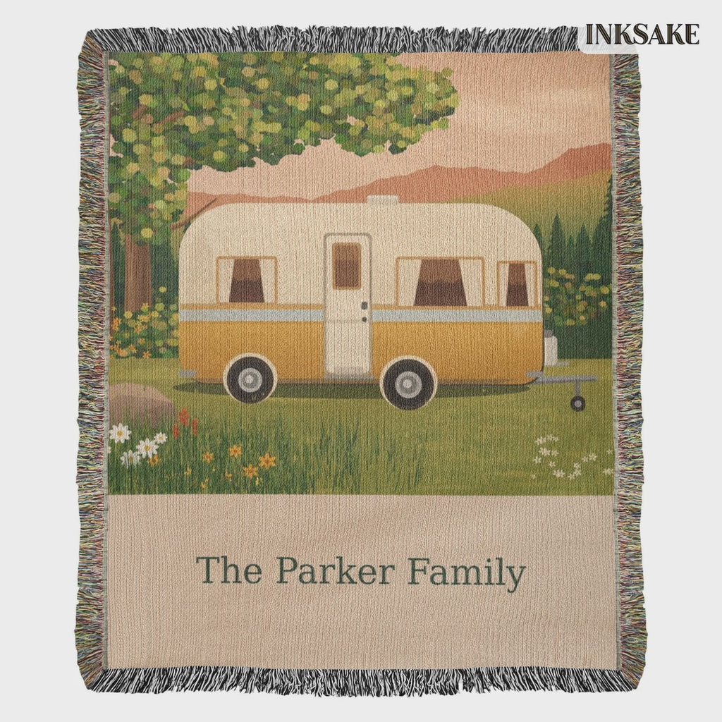 Personalized family caravan woven blanket with The Parker Family lettering, shown full length and laid on the floor