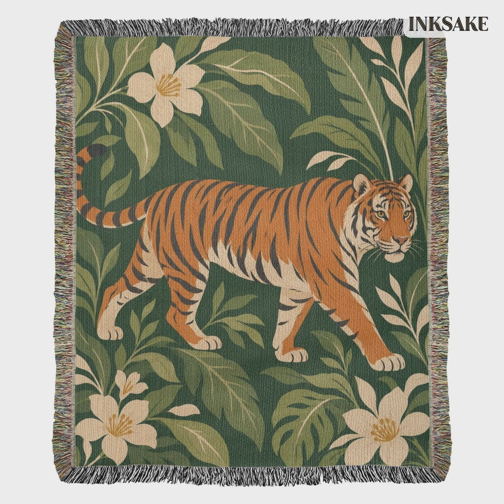 Tiger Botanical woven cotton blanket with a striding tiger among tropical leaves and blooms