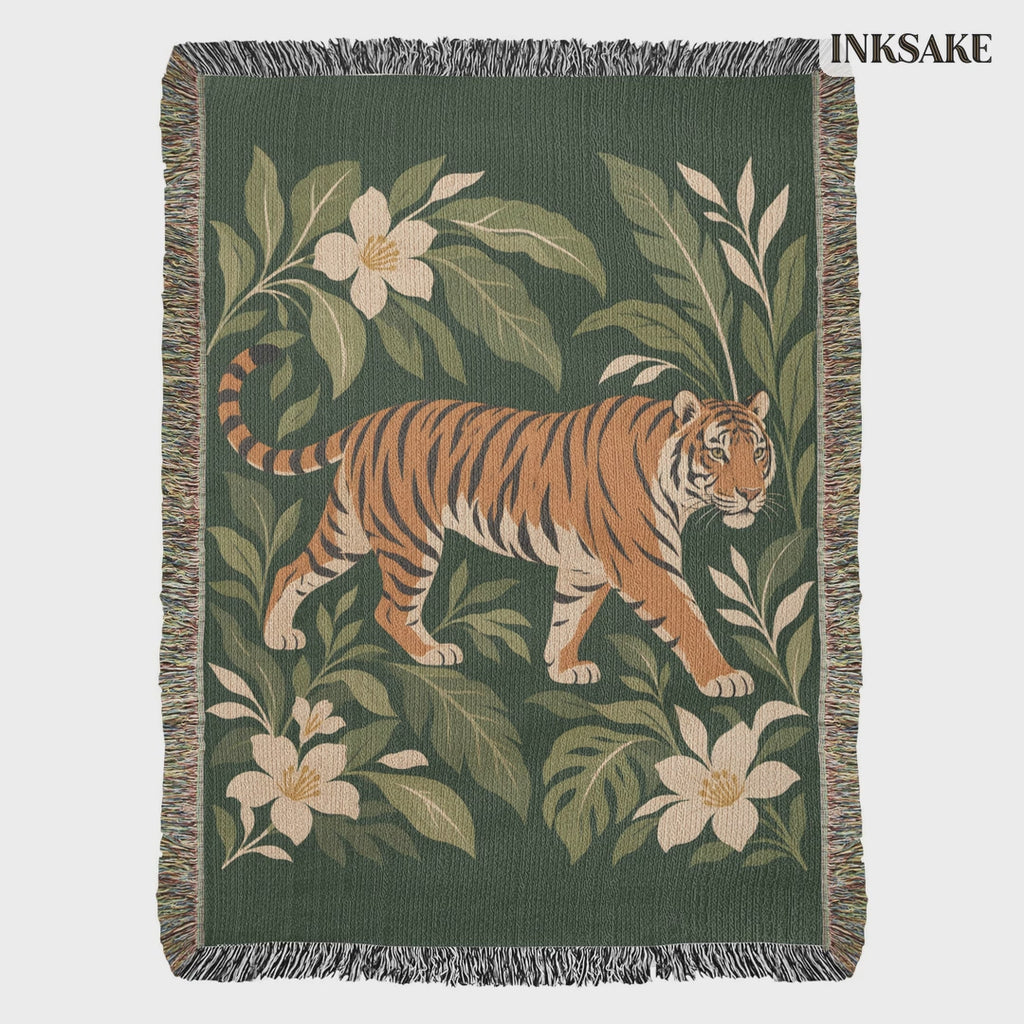 Tiger Botanical woven cotton blanket video: the full front on white, then hung on an outdoor line among trees with a slow zoom on the striding tiger.