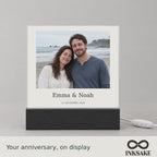 Personalized anniversary photo plaque with names and date on a color-changing LED base