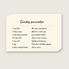 Angled view of the Sunday pancakes recipe canvas showing its gallery-wrap depth, with the cream background wrapping around the edges.